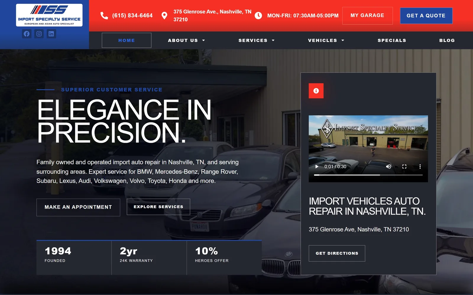 importspecialty.com, auto repair website design: a red and blue header bar above a night shot of the lot