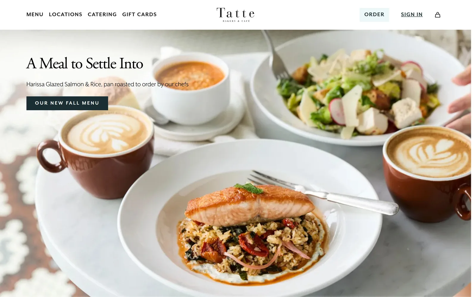 tattebakery.com, bakery website design: a marble table of salmon