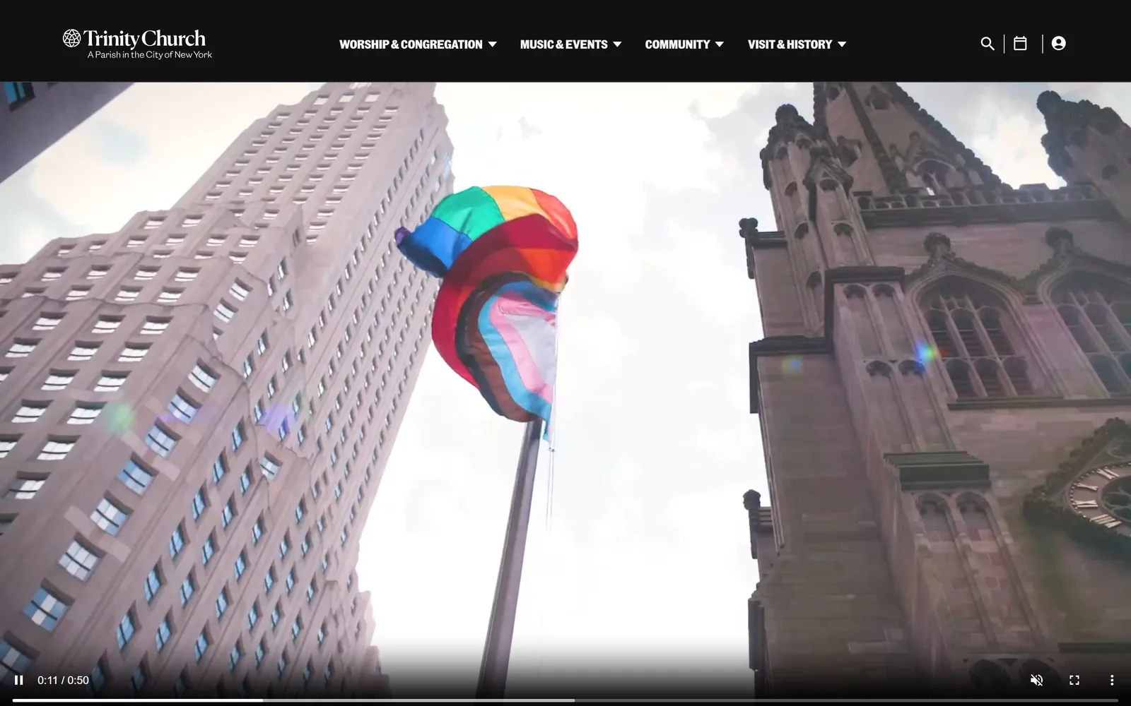 trinitychurchnyc.org, church website design: a looking up video of the Gothic spire beside a limestone tower