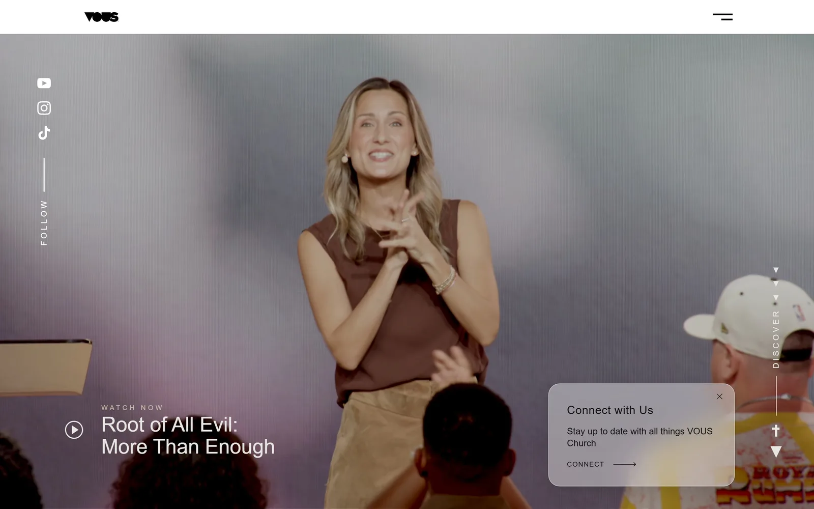 vouschurch.com, church website design: a full screen video of a speaker on a lavender lit stage