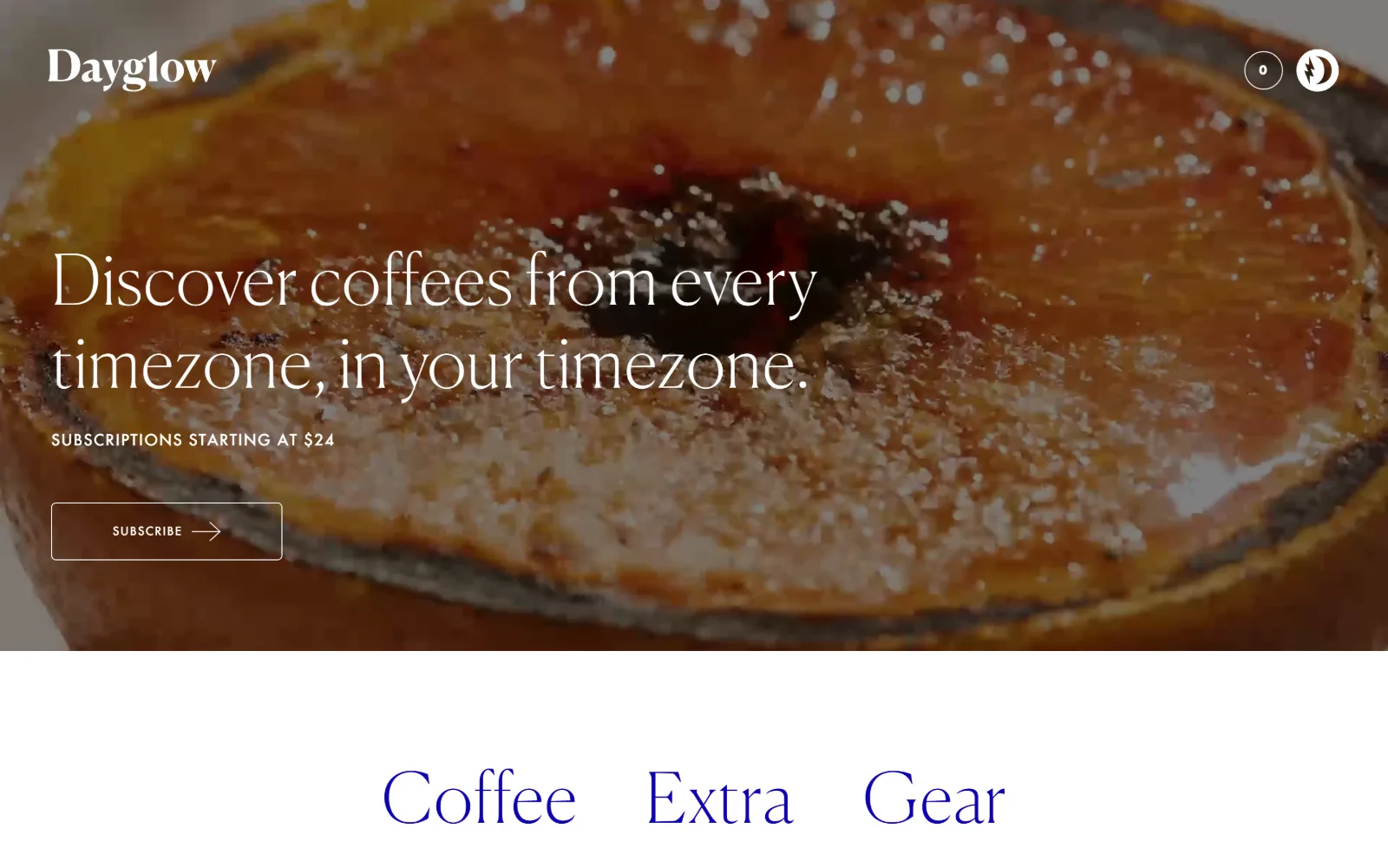 dayglow.coffee, coffee shop website design: slow video of a broiled grapefruit half fills the frame behind a thin white serif line about