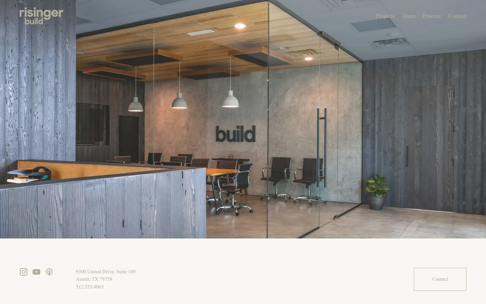 risingerbuild.com, construction website design: their own office photographed as the hero