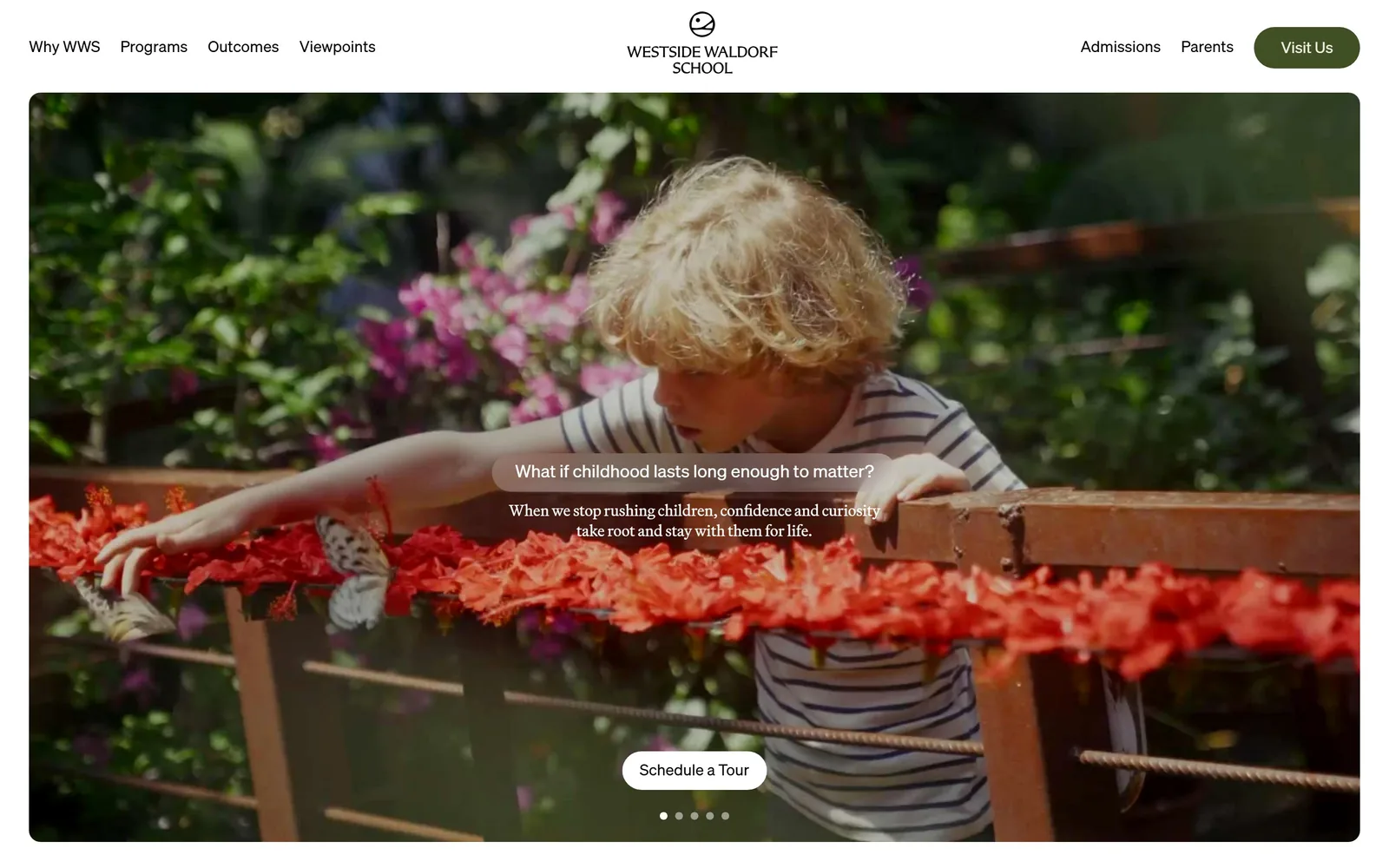 westsidewaldorf.org, daycare website design: a rounded video card of a boy at a flower bed fills a white frame