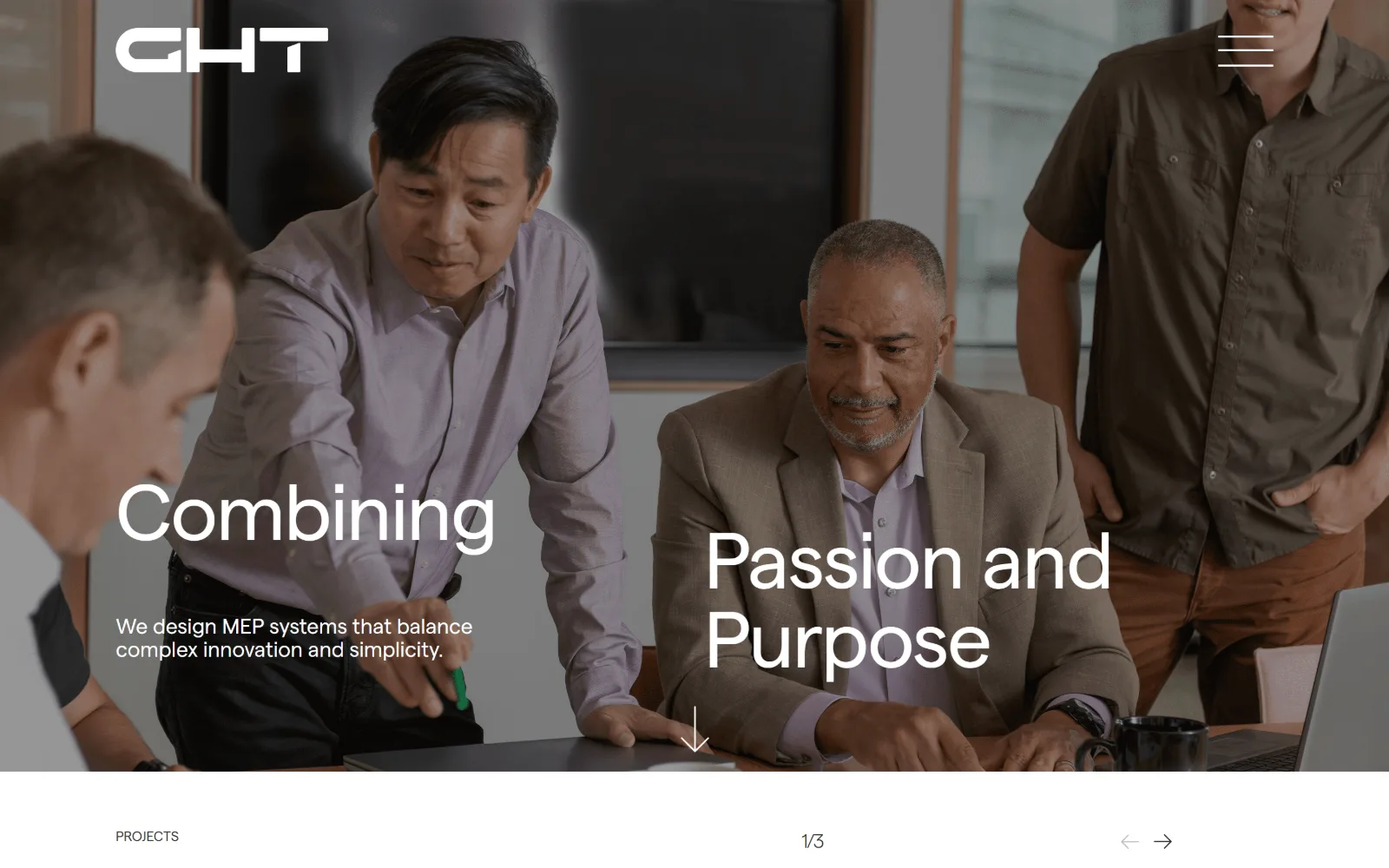 ghtltd.com, engineering website design: four colleagues around a laptop fill the frame