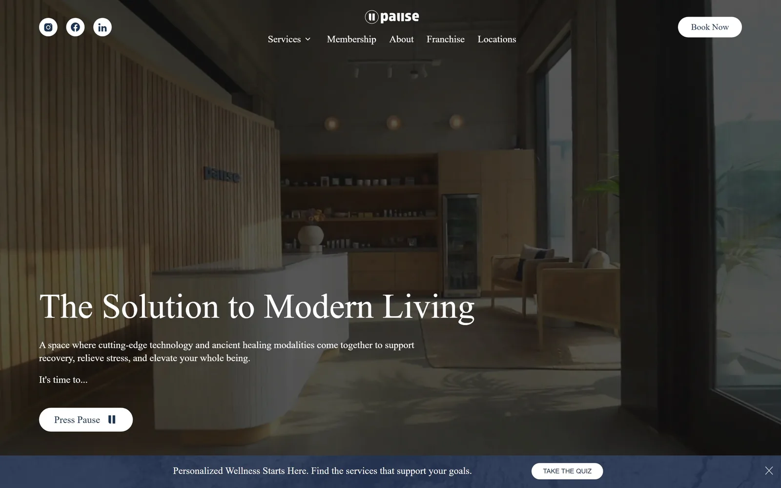 pausestudio.com, gym website design: dim recovery lounge with fluted wood and three warm pendants