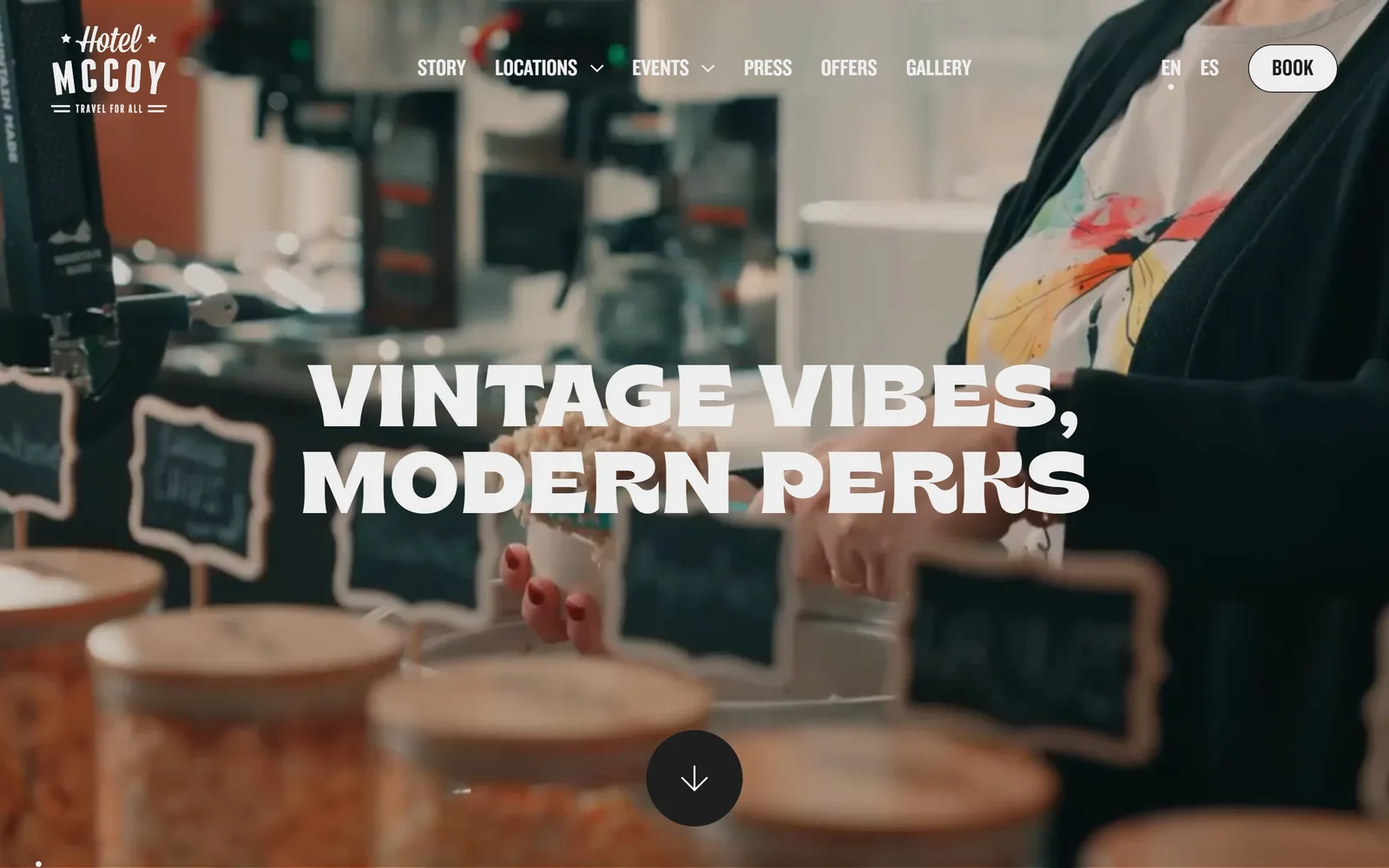 hotelmccoy.com, hotel website design: vINTAGE VIBES, MODERN PERKS in heavy condensed caps across a shallow-focus video of a coffee counter