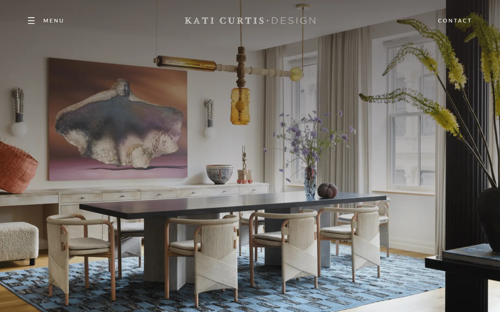 katicurtisdesign.com, interior design website design: a pale dining room with a blue rug and large abstract canvas runs full bleed