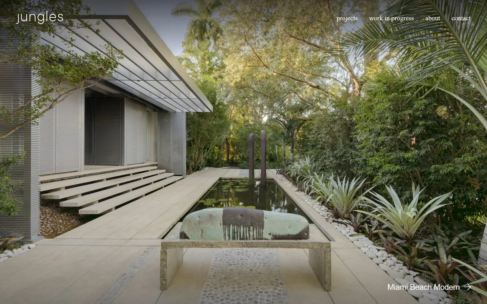 raymondjungles.com, landscaping website design: full bleed Miami garden with a black reflecting pool