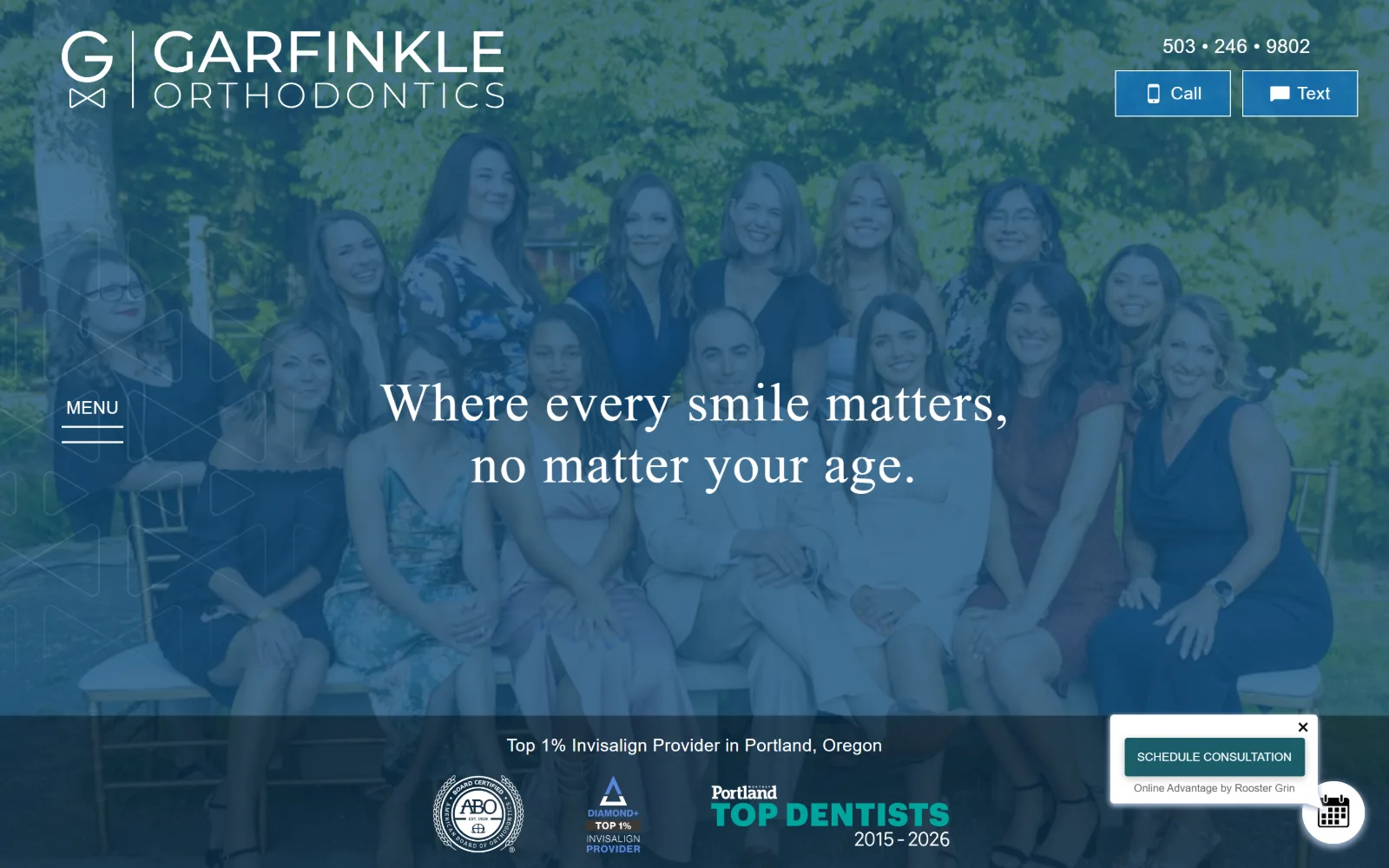 garfinkleortho.com, orthodontist website design: fifteen staff posed on chairs in front of trees, the whole photograph washed in flat blue