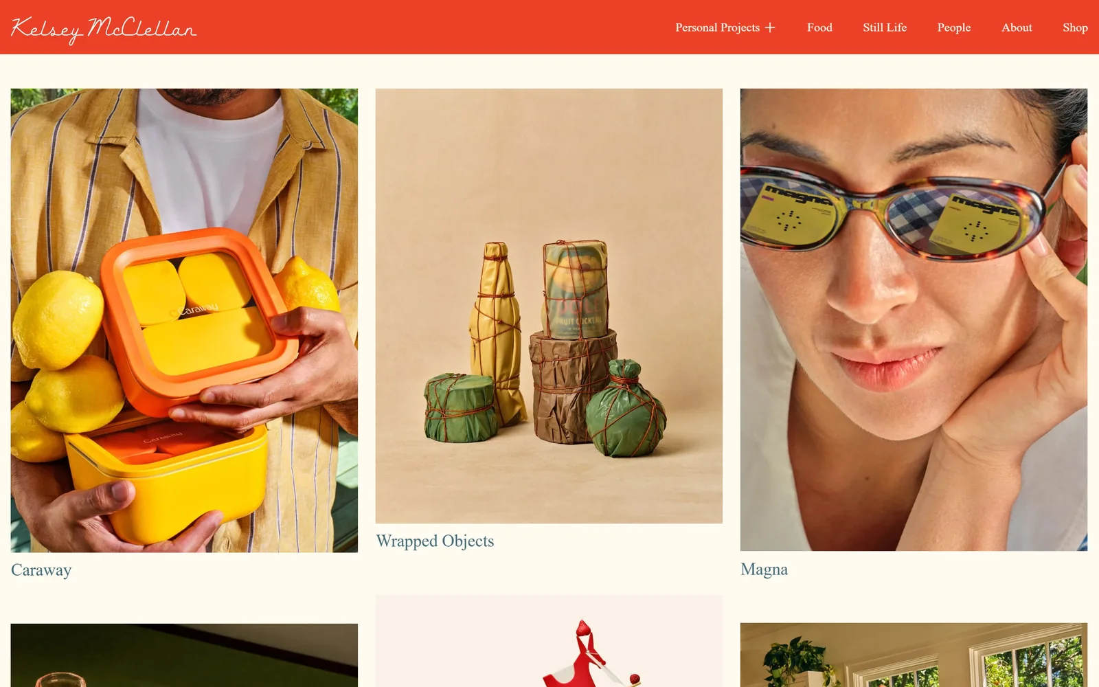 kelseymcclellan.com, photography website design: a tomato-red nav band with a looping script signature sits over a cream page of food