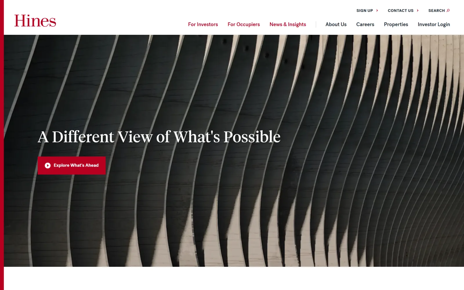 hines.com, property management website design: an abstract black and cream photograph of curved fins runs behind a serif headline and one