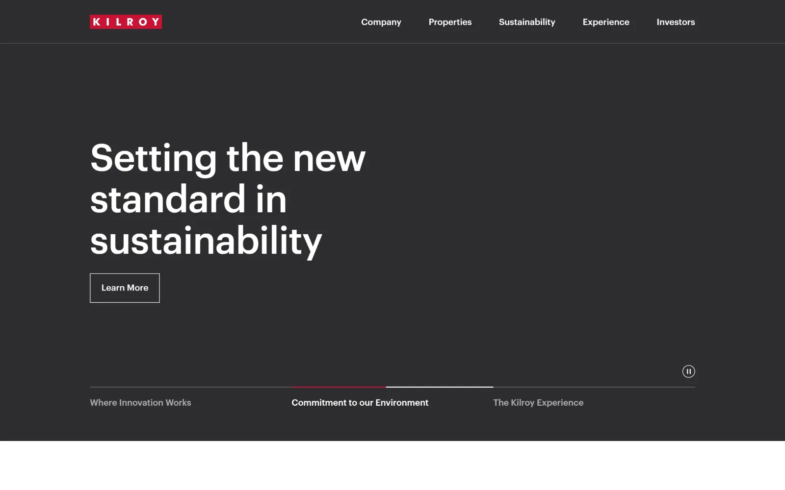 kilroyrealty.com, property management website design: a flat charcoal field carries a three-line white headline and an outlined Learn More