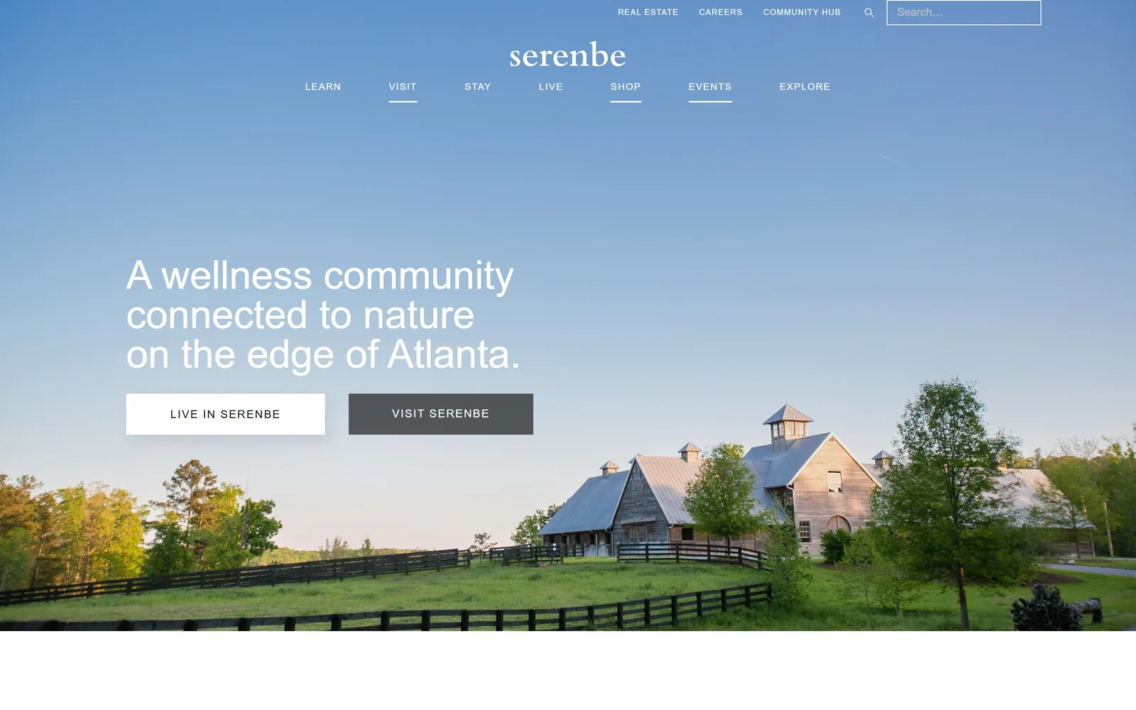 serenbe.com, real estate website design: barns on a green field under an enormous clear blue sky