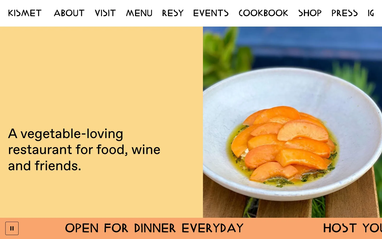 kismetlosangeles.com, restaurant website design: apricot panel carrying a three-line statement, a bowl of sliced persimmon alongside