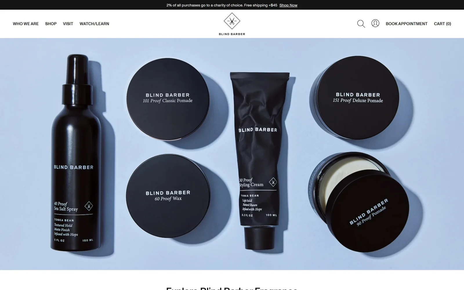 blindbarber.com, salon website design: six black grooming products arranged flat on a pale blue backdrop