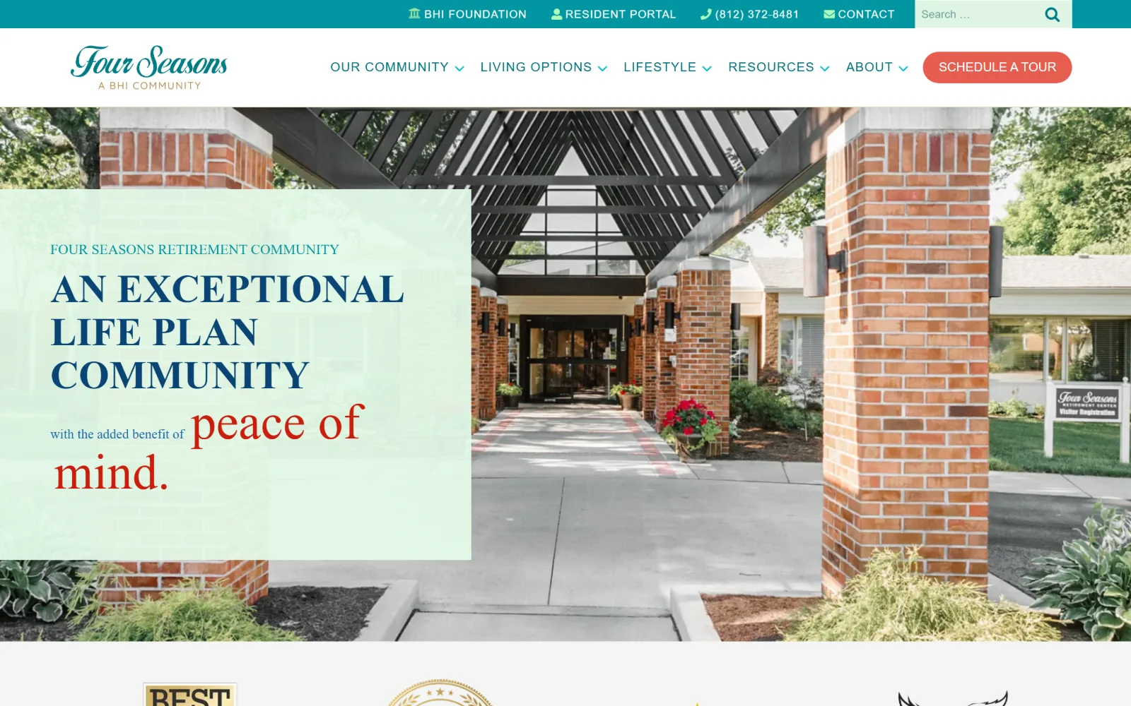 fourseasonsretirement.com, senior living website design: a brick entry canopy photographed down the walkway