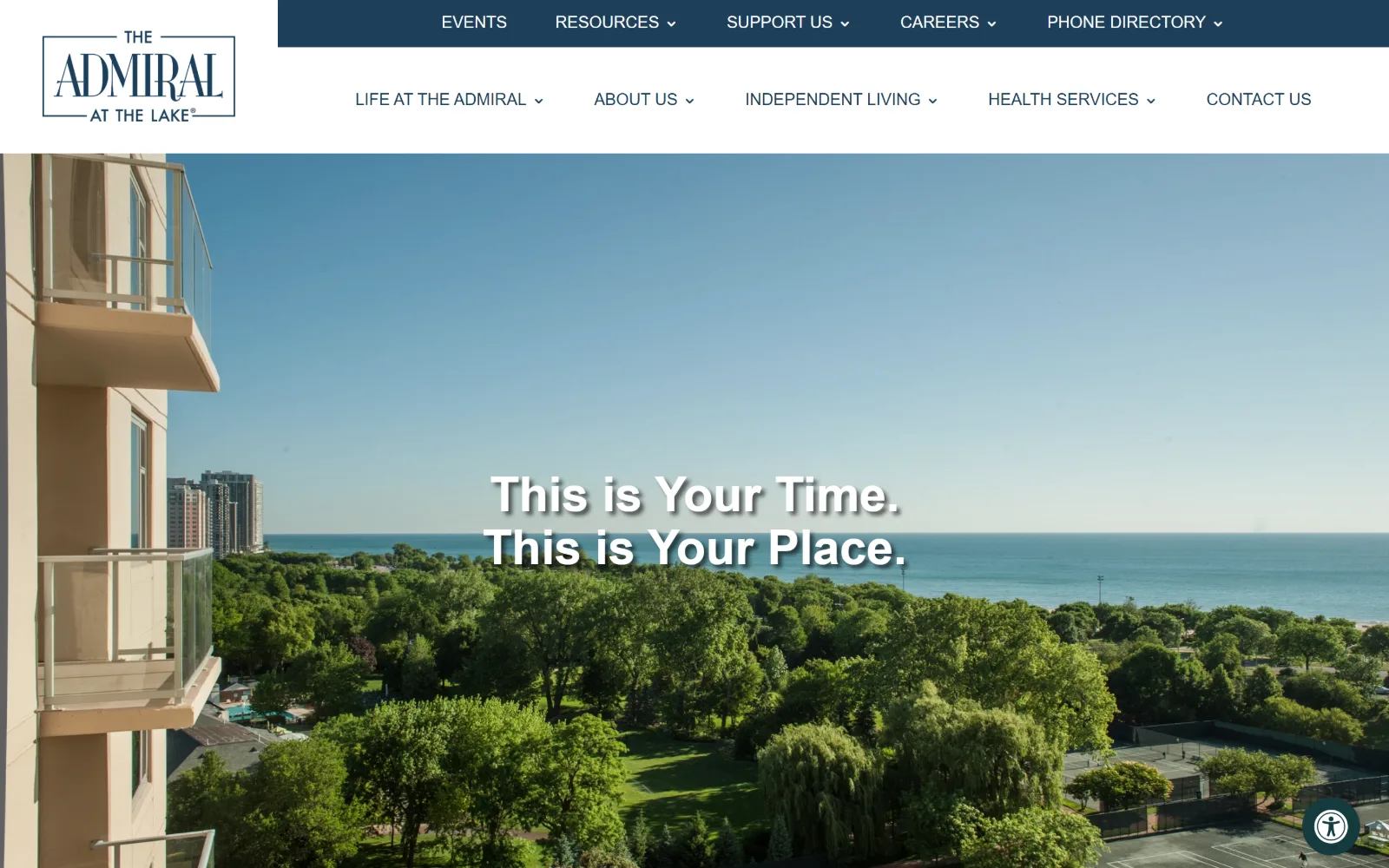 theadmiral.org, senior living website design: an aerial view from a balcony across Lincoln Park treetops to Lake Michigan