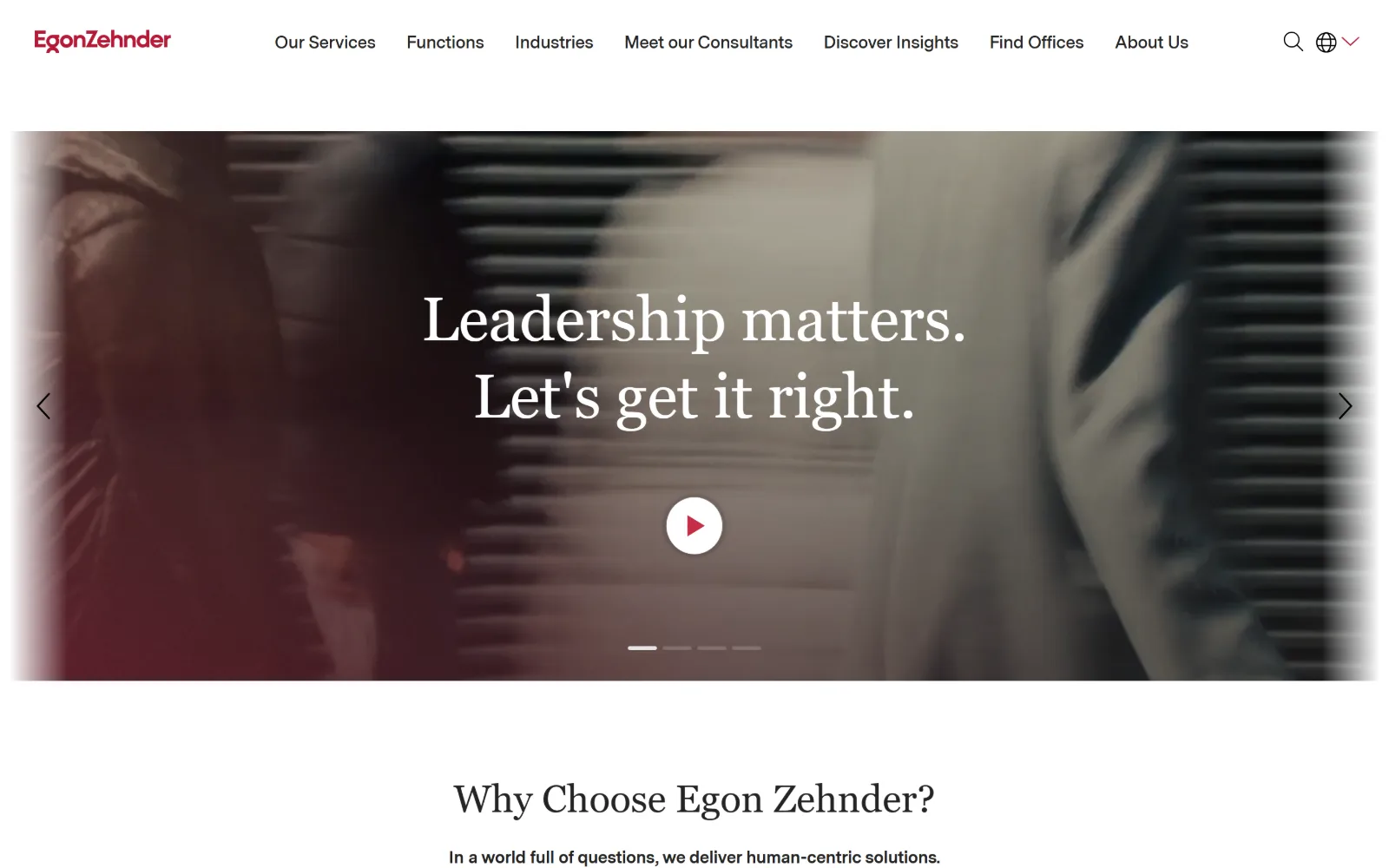 egonzehnder.com, staffing agency website design: white header with a crimson wordmark above a motion-blurred photographic band