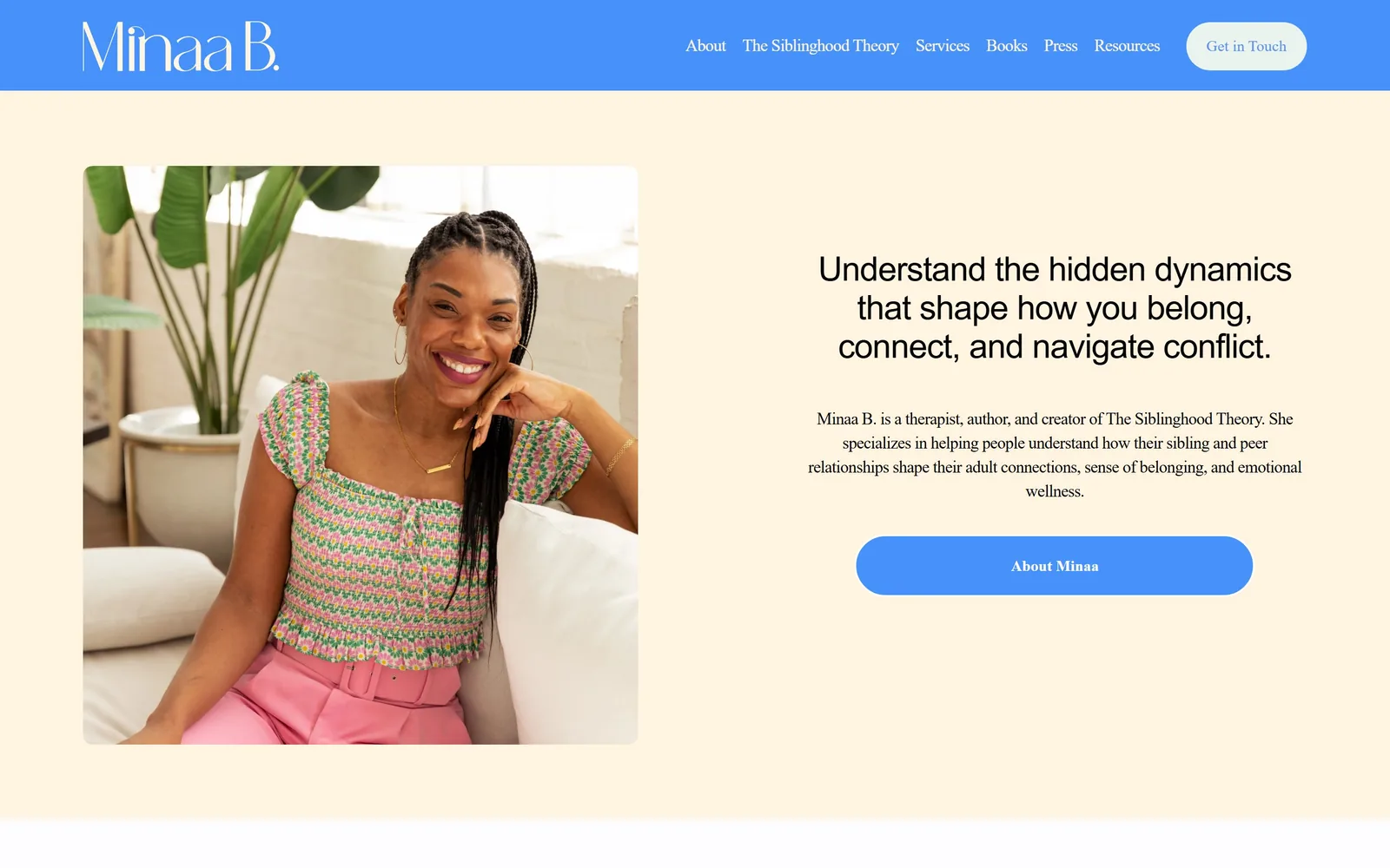 minaab.com, therapist website design: a cornflower blue nav band over cream, a centred portrait in pink and green