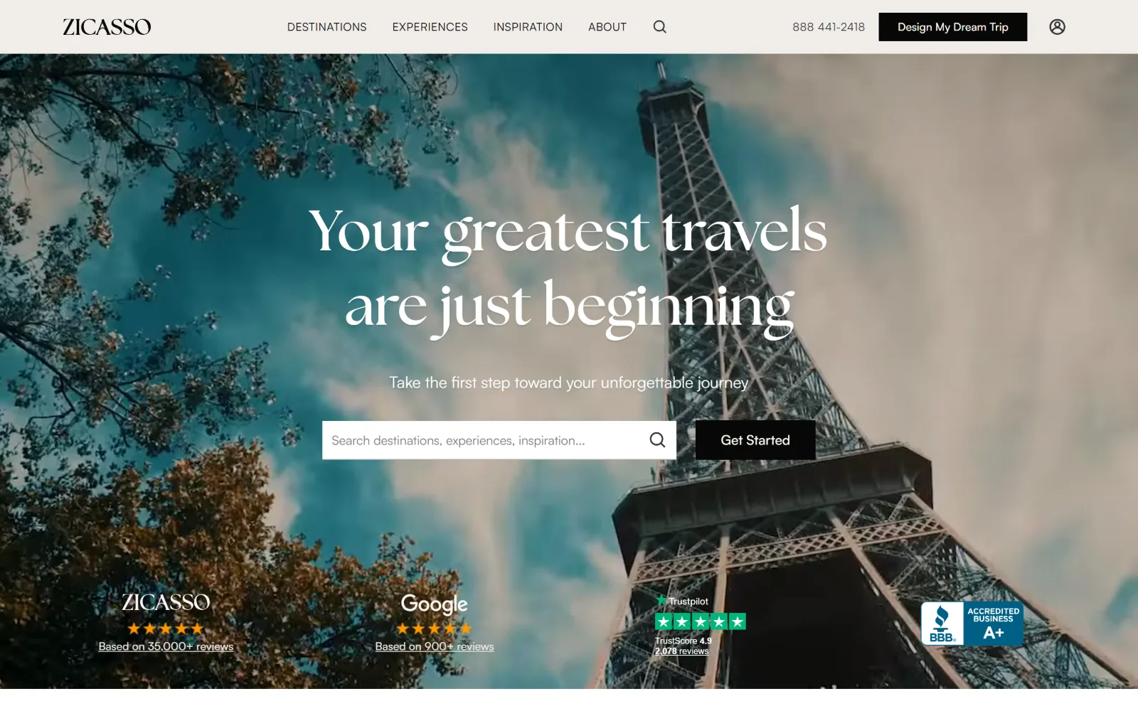 zicasso.com, travel agency website design: an upward shot of the Eiffel Tower through blossom fills the hero, with a search field
