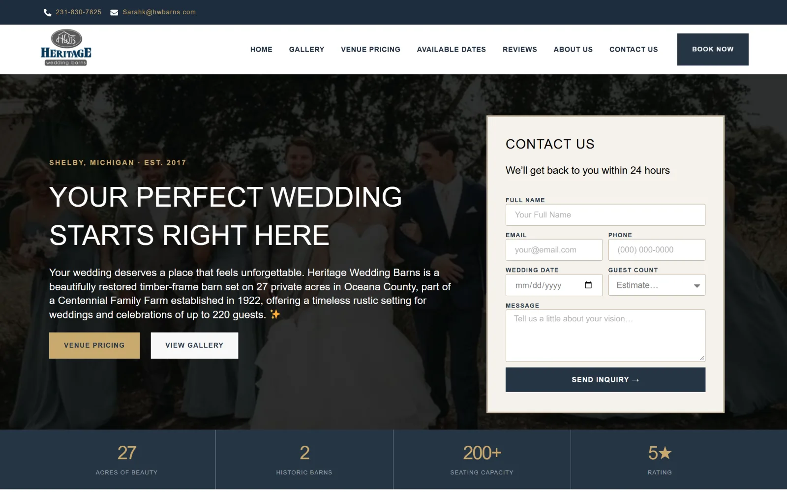 heritageweddingbarns.com, wedding venue website design: a darkened photo of a wedding party walking under trees sits behind a cream